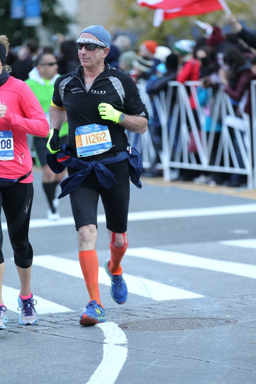 Michael Rubinfeld at Columbus Circle, 1/2 mile from the finish of his 21st NYC, 65th marathon